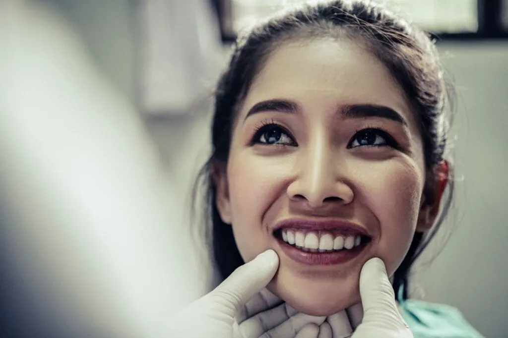 Patient smiling during an orthodontic consultation in Riverside, CA